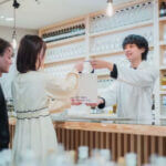 B2B perfume manufacturer production facility with fragrance bottles and packaging equipment for custom brand solutions