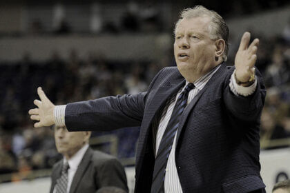 Max Good American basketball coach during game timeout at Maine Central Institute prep school
