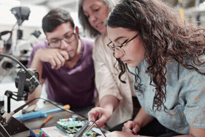 Nova Scola classroom showing students engaged in collaborative project-based learning with technology integration