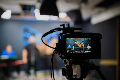 StarStream satellite network diagram showing LEO satellites connecting remote areas for live video streaming and analytics