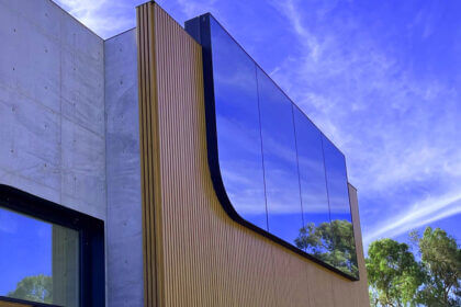 Modern aluminium cladding facade on commercial building showing fire-rated panels and thermal performance design