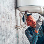 Water heater showing common problems like sediment buildup and leaks that need repair