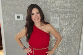 Mrs. Poindexter Crystal Jackson in red dress smiling, social media influencer with million-dollar net worth